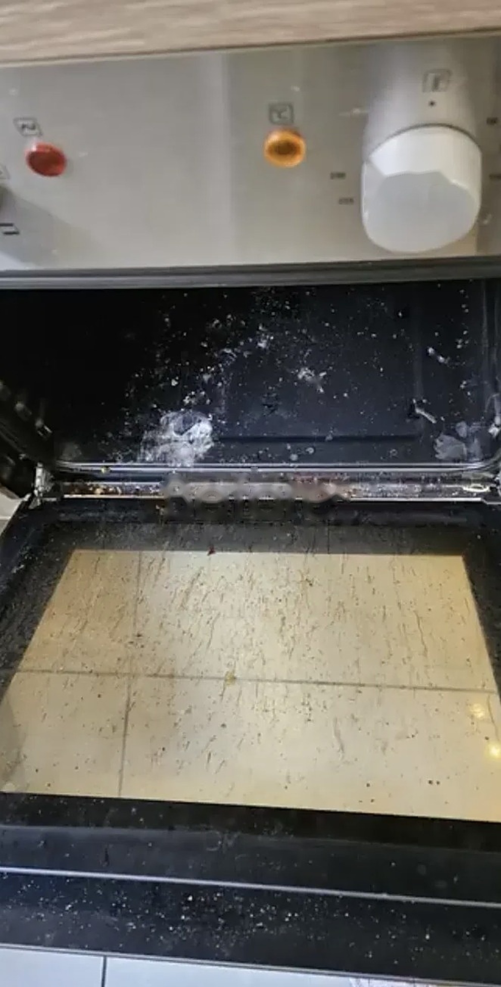 Oven interior with baked-on grease and grime before deep cleaning in Norwich